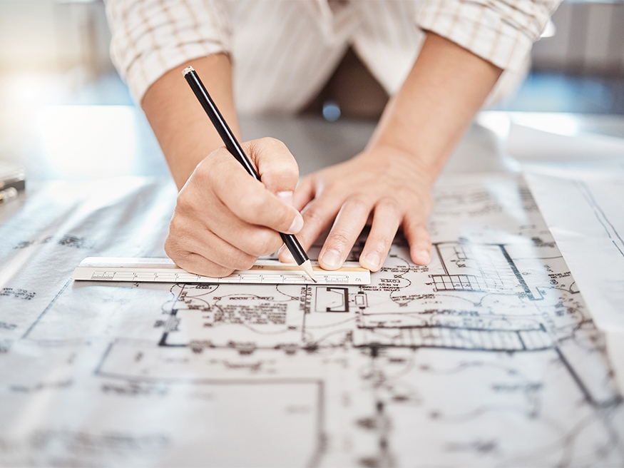 An architect working on planning permission drawings